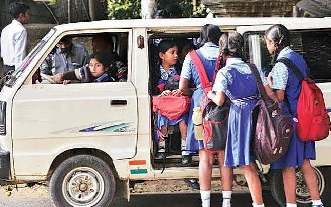 Schoolgirls boarding a white van that is already visibly full of children